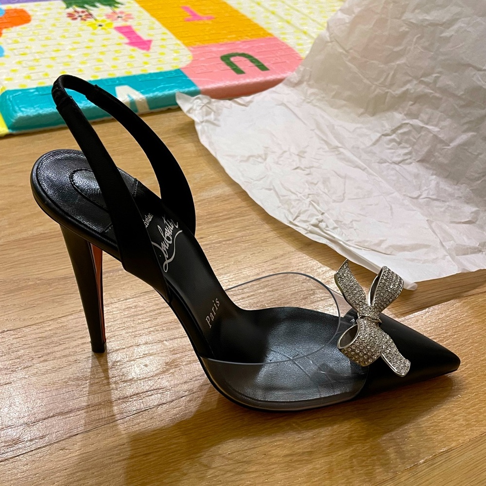 Christian Louboutin
Women's Black Astrinodo Leather And Pvc Pumps